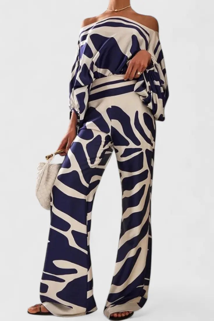 Sybella Conjunto de Dos Piezas con Hombros Descubiertos y Pantalones Amplios Estampados Alba Madrid