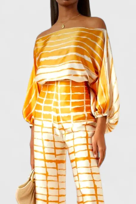 Sybella Conjunto de Dos Piezas con Hombros Descubiertos y Pantalones Amplios Estampados Alba Madrid